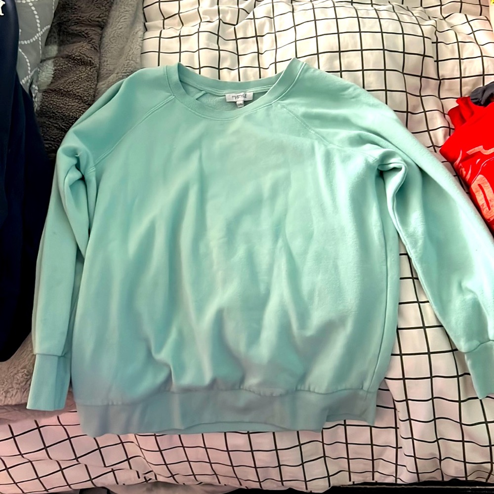 This is a size large crewnecks from Giant Tiger